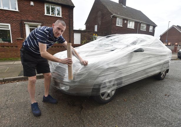 Neil-Junglas-from-Hunts-Cross-wrapped-a-car-parked-outside-his-house-with-cling-film-Picture-J...jpg