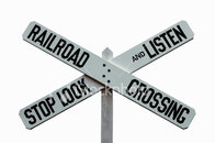 stock-photo-1277156-classic-railroad-crossing-stop-look-and-listen-caution-warning-sign.jpg