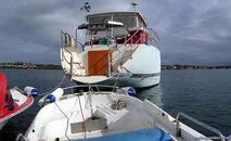 080409_Stern_ofYacht_DarkClouds_Pano01_550w_opt8ADV.jpg