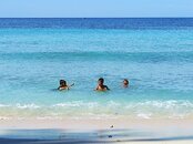 1.1271952722.kids-playing-in-the-water-at-sumur-tiga-beach.jpg