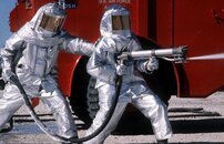 Fire_fighters_practice_with_spraying_equipment,_March_1981.jpg