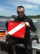 Brandon Sossamon with recovered dive flag.jpg