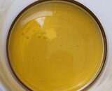 200 hours old oil v3 - reduced oil level to see water droplets at container bottom.JPG