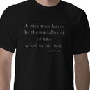 a_wise_man_learns_by_the_mistakes_of_others_a_f_tshirt-p235850657485328287en7m7_400.jpg