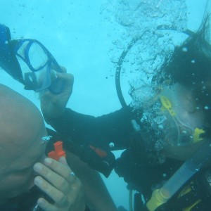 Quadriplegic diver having mask removed and replaced