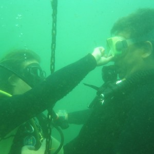 Quadriplegic diver having ears equalized