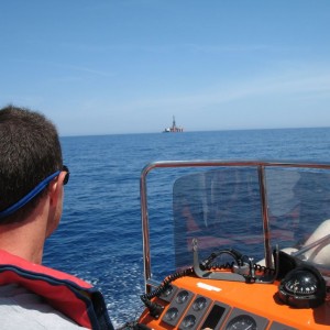 Sea Explorer drilling rig in the distance