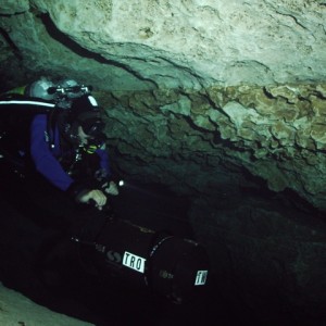 Troy on his scooter in Cave Training