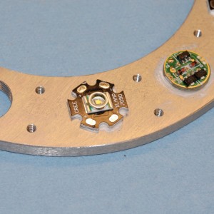 Backer ring with LED and regulator