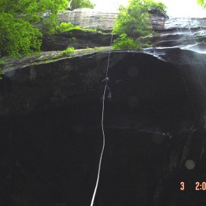 Rappelling next to the water fall