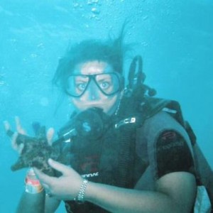 Me with a starfish in Cancun.