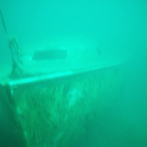 An old yacht in Miracle Waters quarry in South Africa