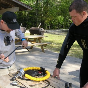 Herman attaches a power inflator hose