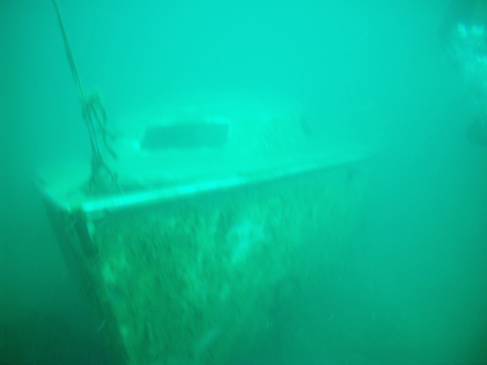 An old yacht in Miracle Waters quarry in South Africa