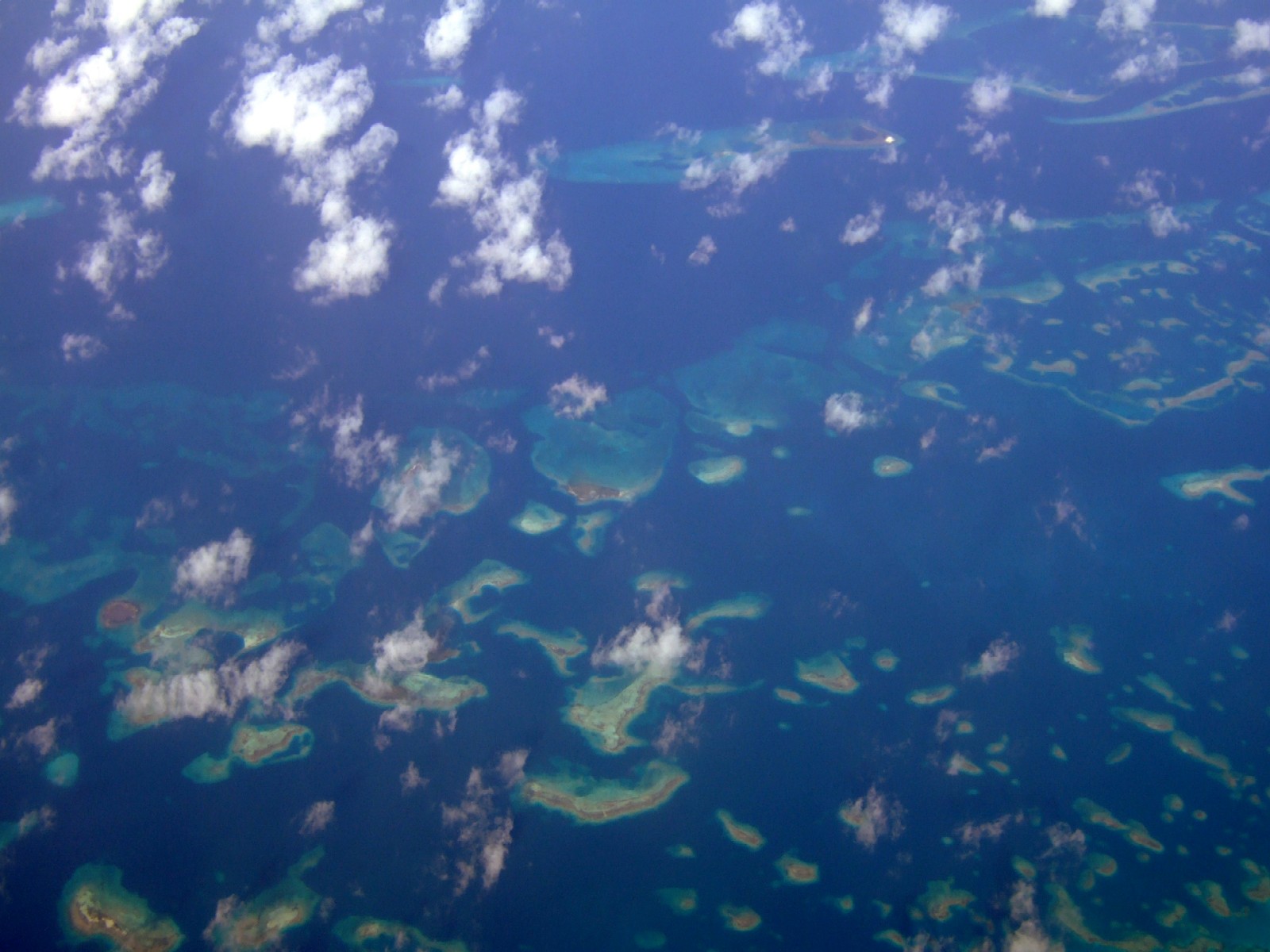 belize barrier reef from aeroplane