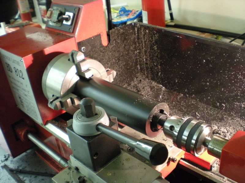 Boring the canister with a short drill bit
