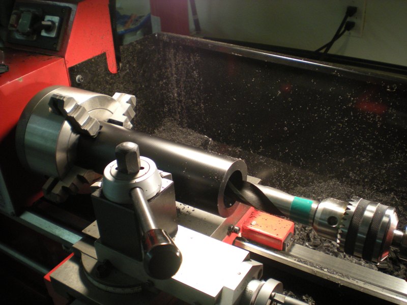 Boring the canister with the long drill bit