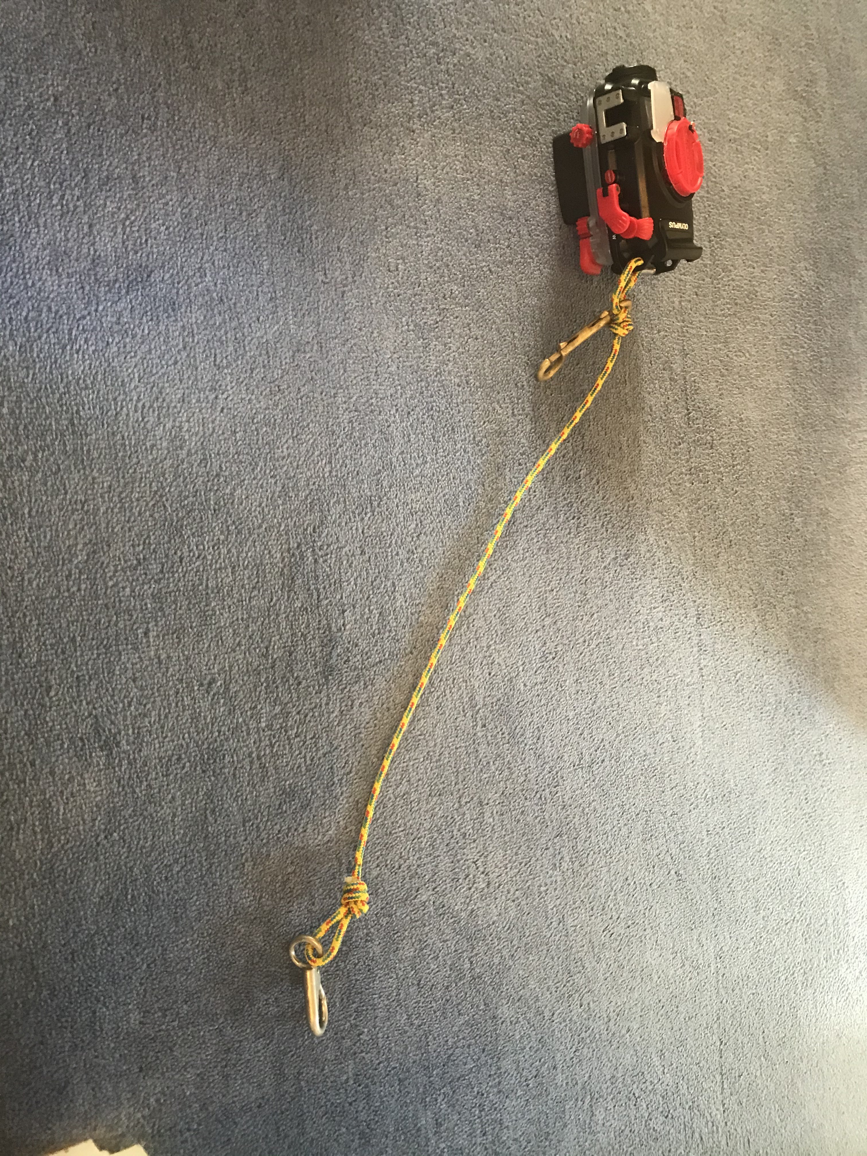 Camera lanyard unclipped