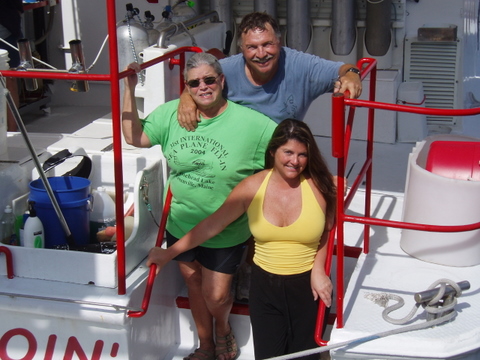 captain Chuck, first mate Peg, and divemaster Krista