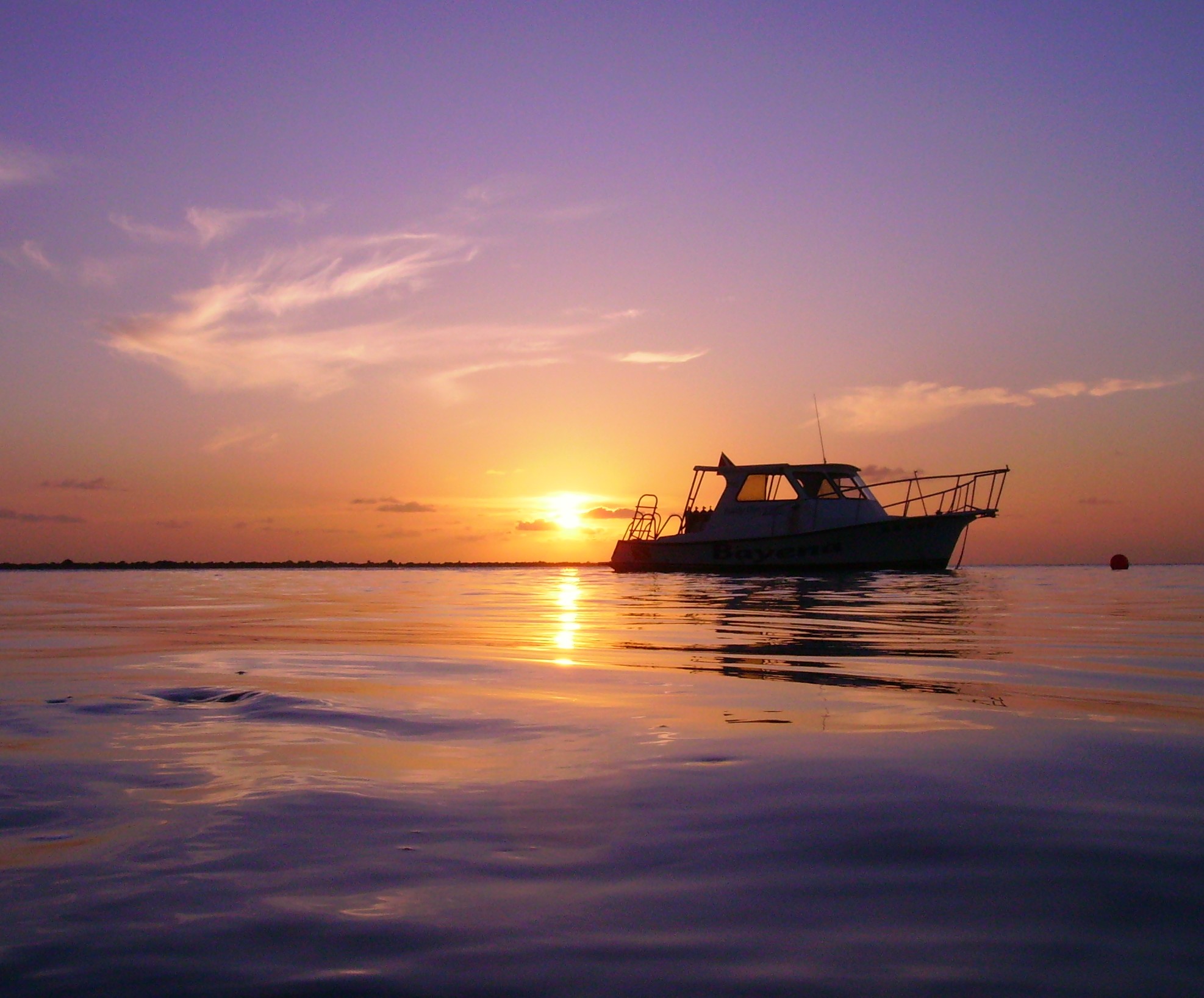 Dive boat at sunset