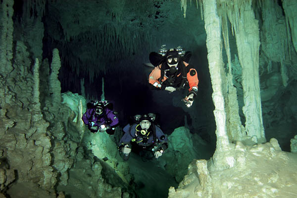 Doc Harry (left), Tom (center) and Leo (right) in a cave.