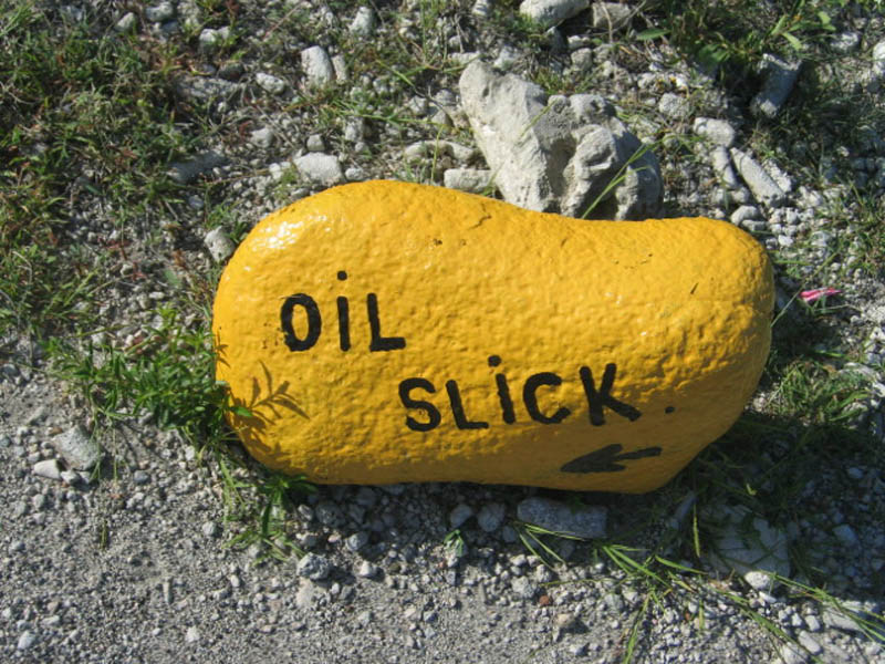 Oil Slick Leap Rock Sign