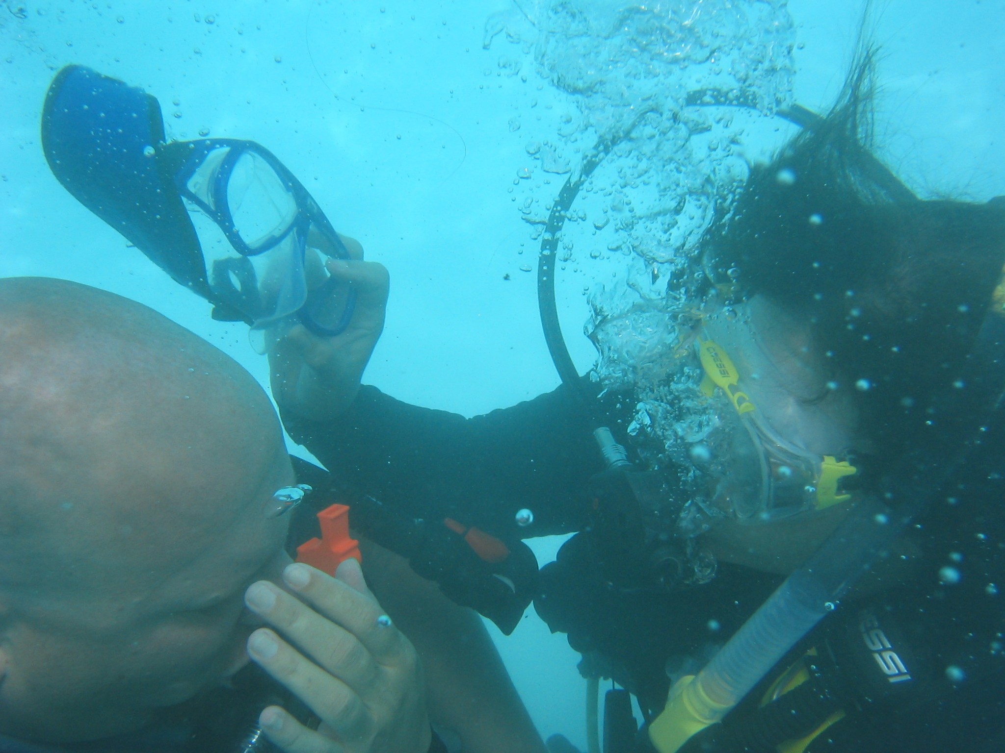 Quadriplegic diver having mask removed and replaced