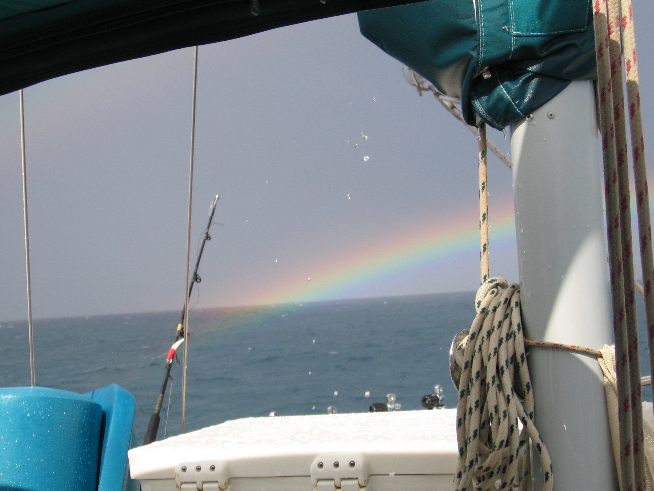 Rainbow_over_stern_of_Island_Skipper