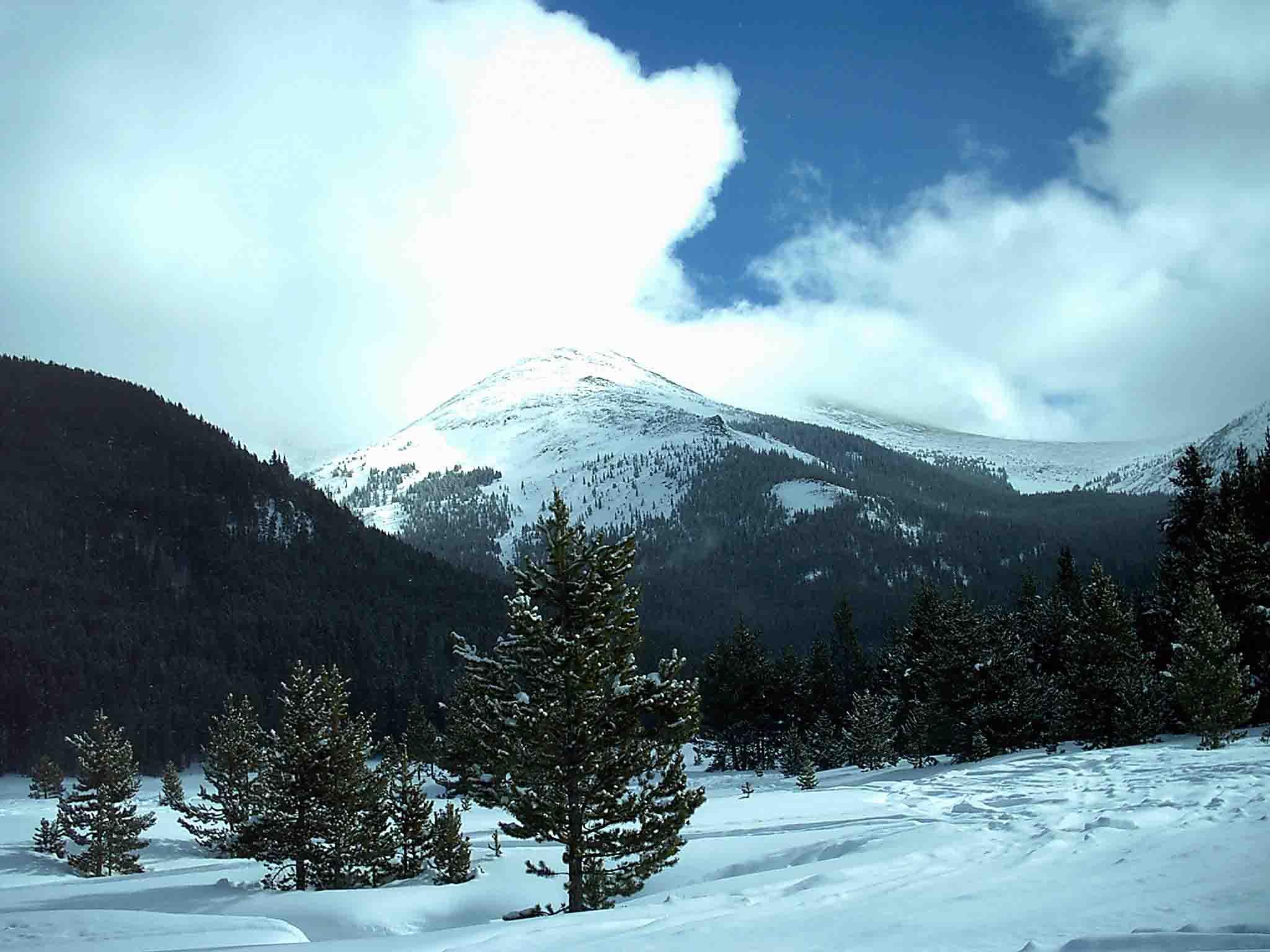 Snowmobiling in the mountains