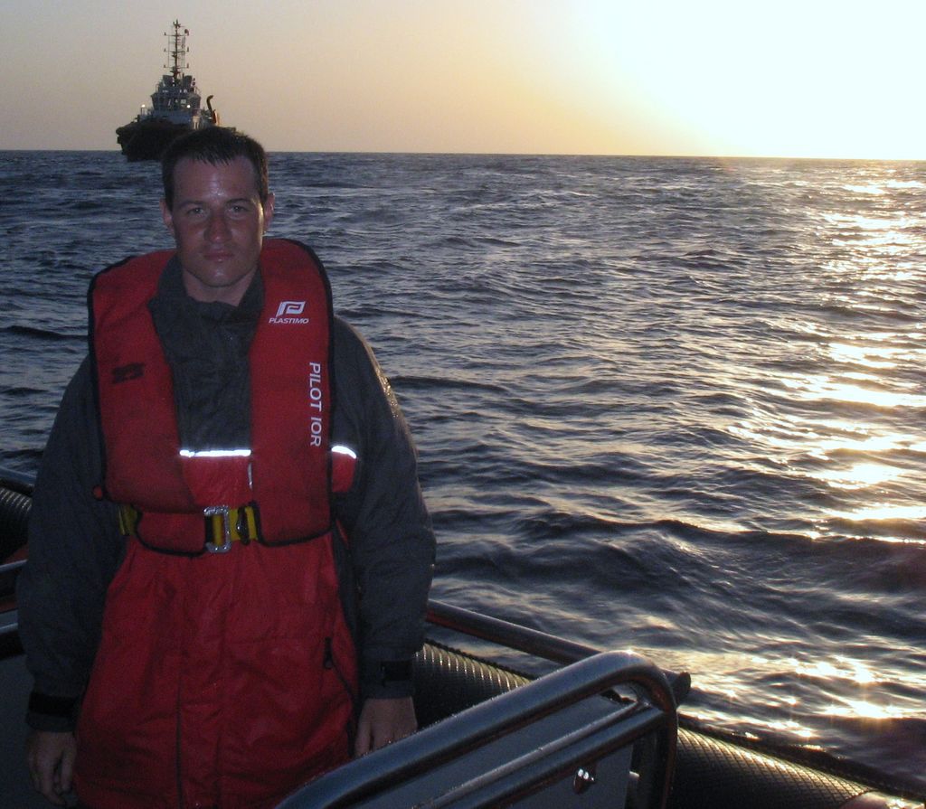 The author at sunset on a windy day