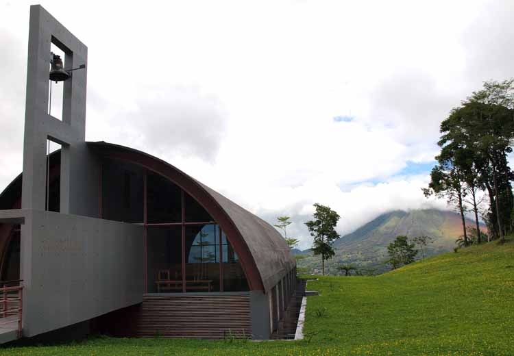 Tomohon-flower_city_w_church_and_mt